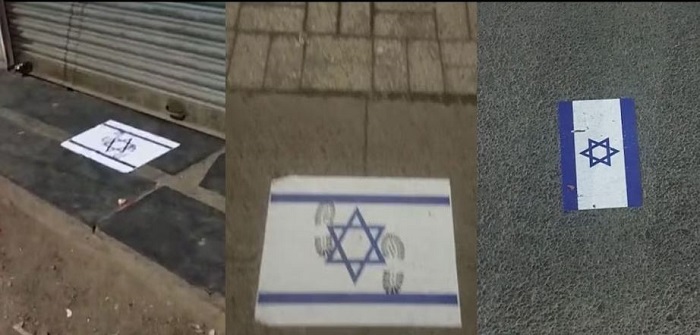 सड़कों पर चिपकाए इजरायल के झंडे