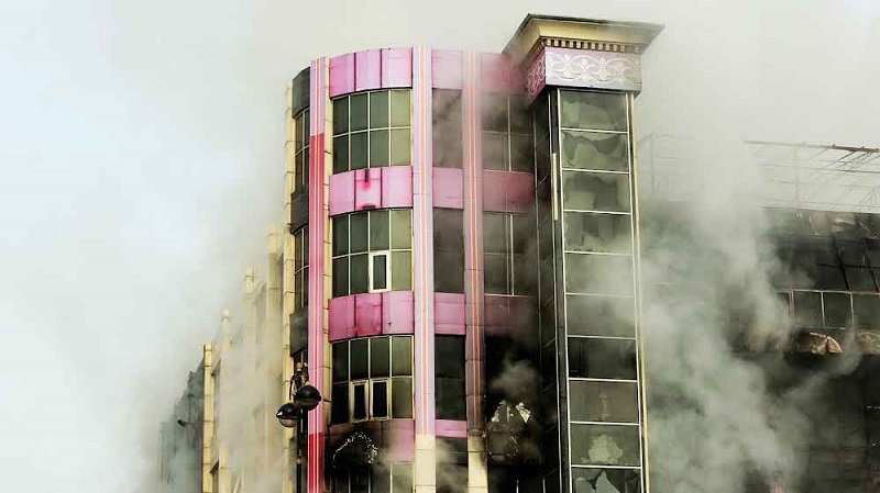 चीनी कोयला कंपनी की इमारत में आग लगने से 19 लोगों की मौत
